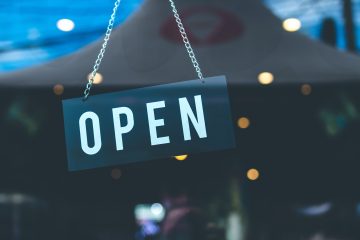 Photo of an open sign in a window